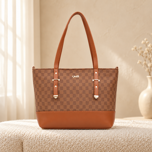 Check Liza Tote — Tan, front view in cozy cream setting