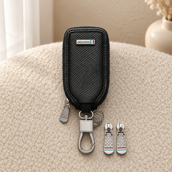 Quill Zippered Leather Car Key Case with Keyring in cozy cream setting