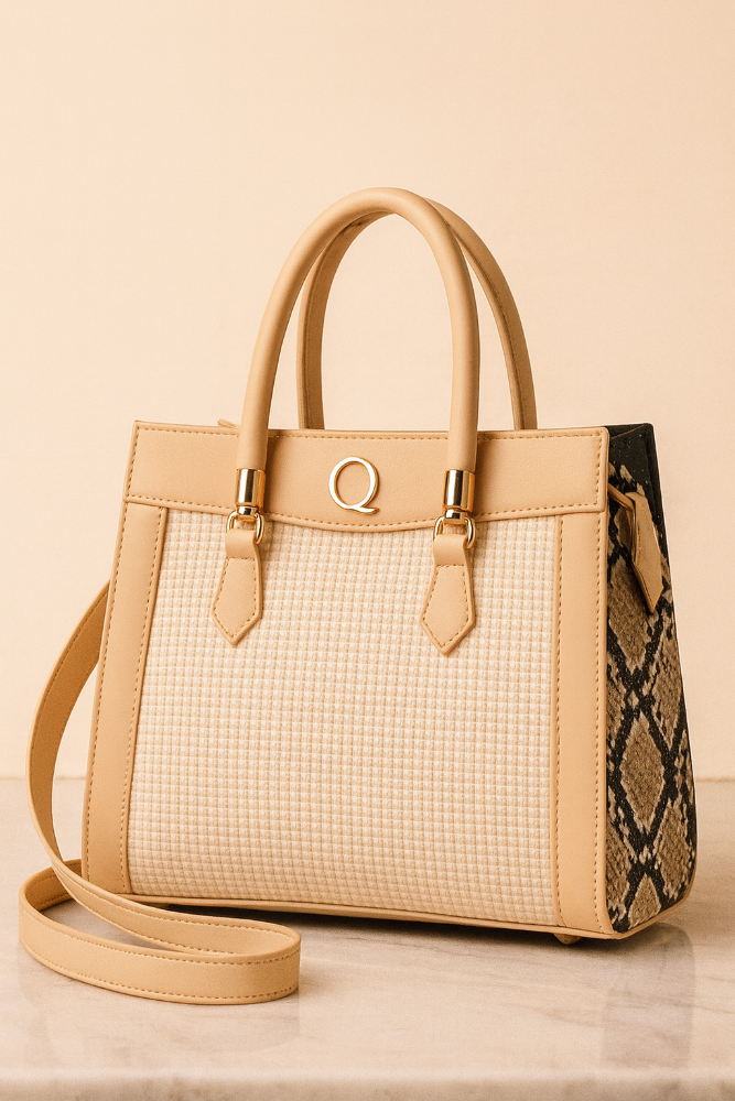 Beige handbag with a grid pattern and snake skin detail on a beige background