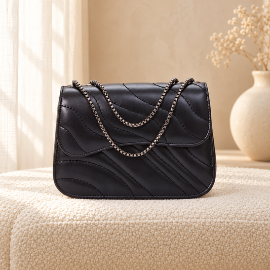 Wave Quilting Chain Strap Handbag for Women | Quill Pakistan Black in a cozy cream setting