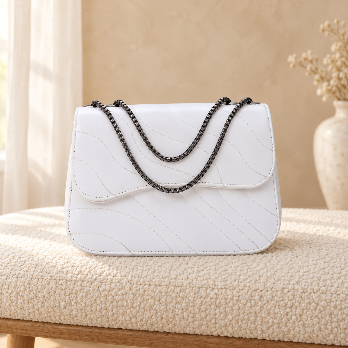 Wave Quilting Chain Strap Handbag for Women | Quill Pakistan White in a cozy cream setting